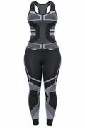Women's black and gray two-piece activewear set featuring a racerback tank top and high-waisted geometric-pattern leggings.
 Copy